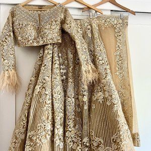 Stunning Gold Lehenga with Feather Details
